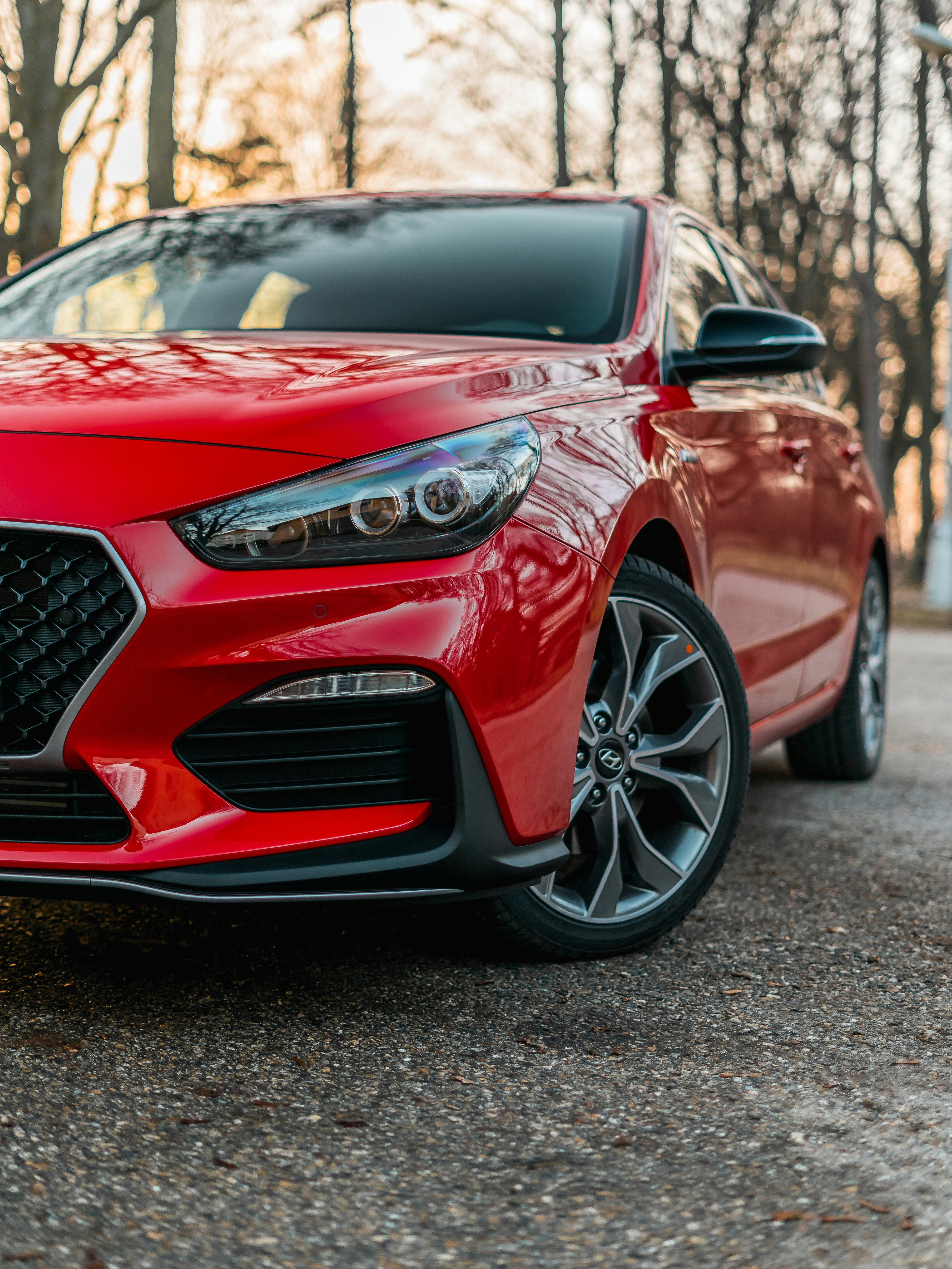 Family sedan in driveway, auto insurance